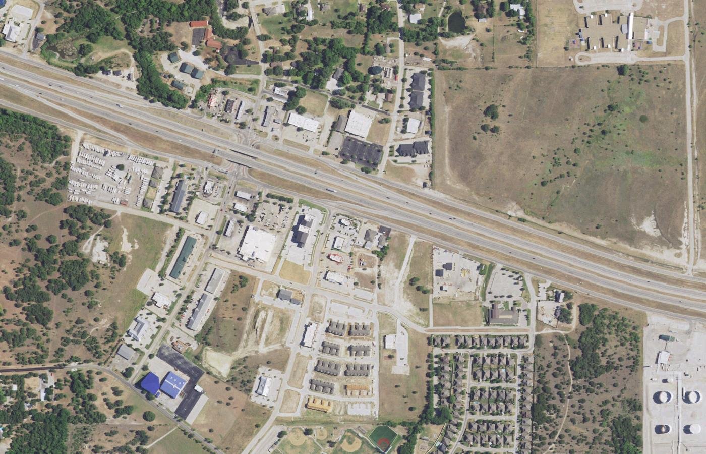 Aerial photograph of central Willow Park, Texas, with Interstate 20 frontage development and residential streets.