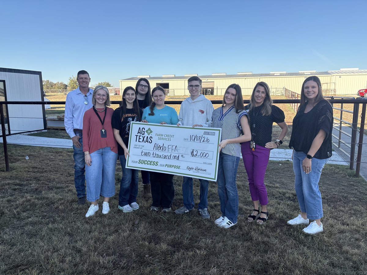 Aledo FFA members receive a $2,000 check from AgTexas Farm Credit Services.